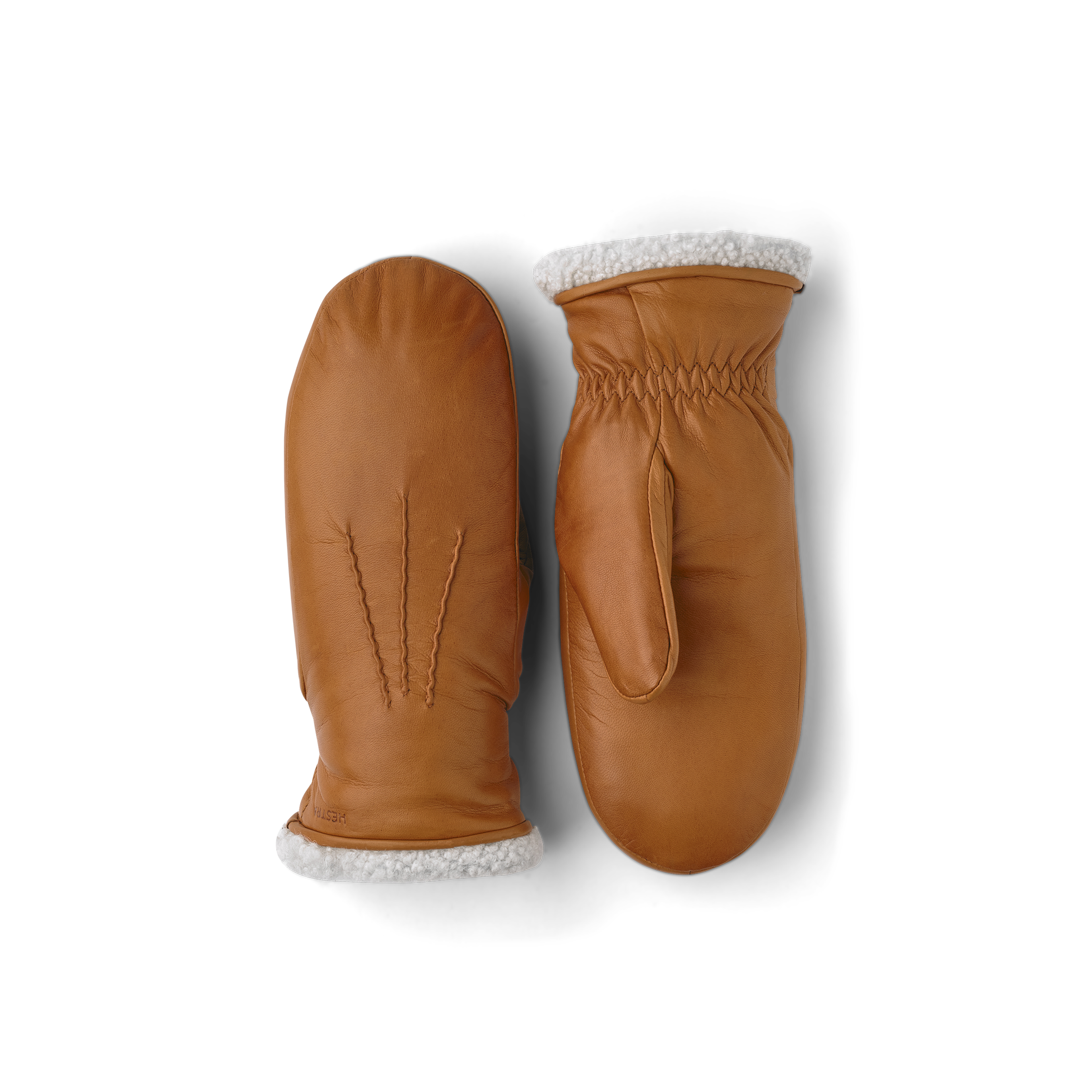 Light brownish-yellow machine-sewn hairsheep leather mitten with white fur trim