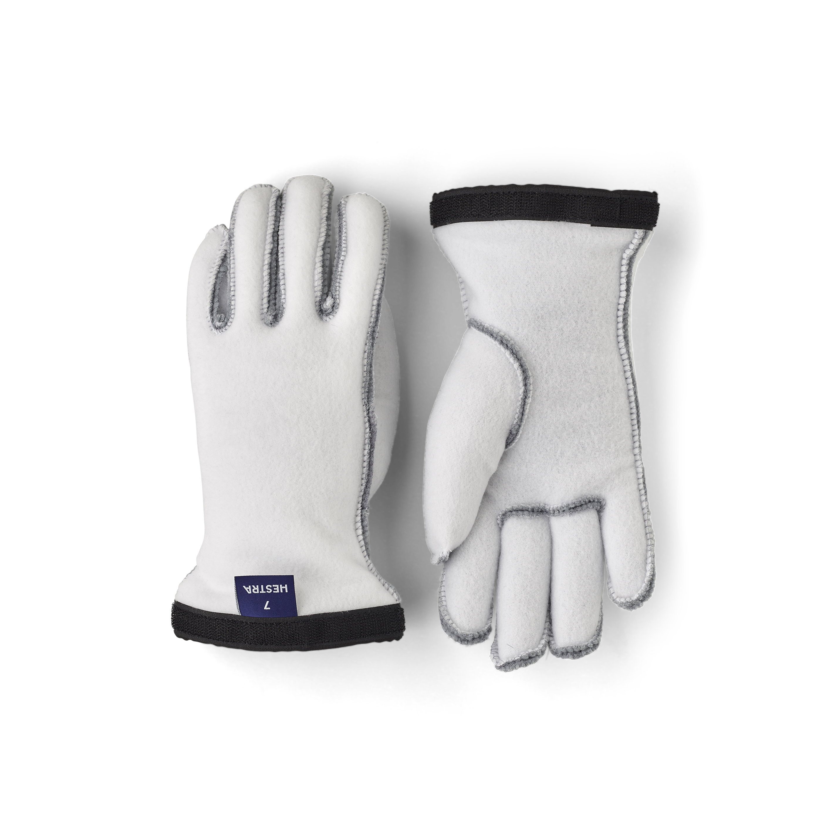 White machine-sewn liner glove
